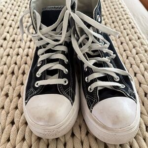 Converse Black and White High-Top Athletic Shoes